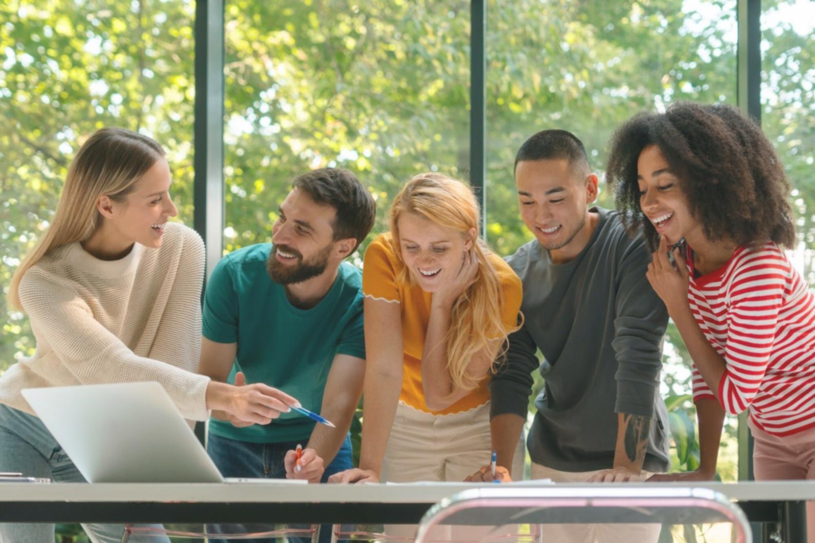 Participants reviewing trading journals and market analysis during study session